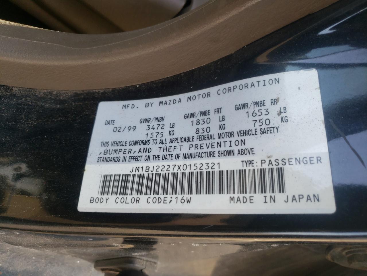 Photo 10 from auction – 1999 MAZDA PROTEGE DX with VIN JM1BJ2227X0152321