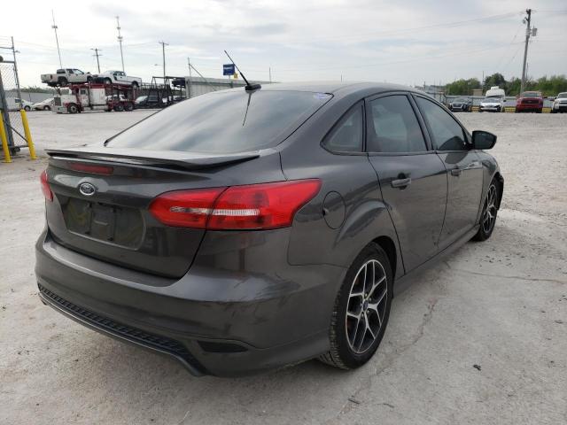 Photo 4 from auction – 2016 FORD FOCUS SE with VIN 1FADP3F23GL288375