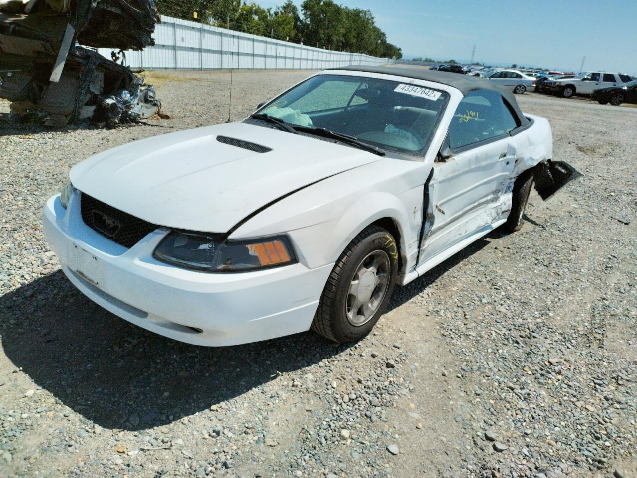 Фото 2 с аукциона – 2000 FORD MUSTANG с VIN 1FAFP4449YF282129