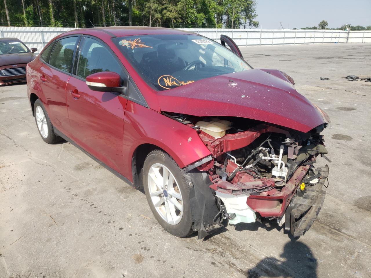FORD FOCUS SE 2016 with VIN 1FADP3F28GL207791 - Photo from auction