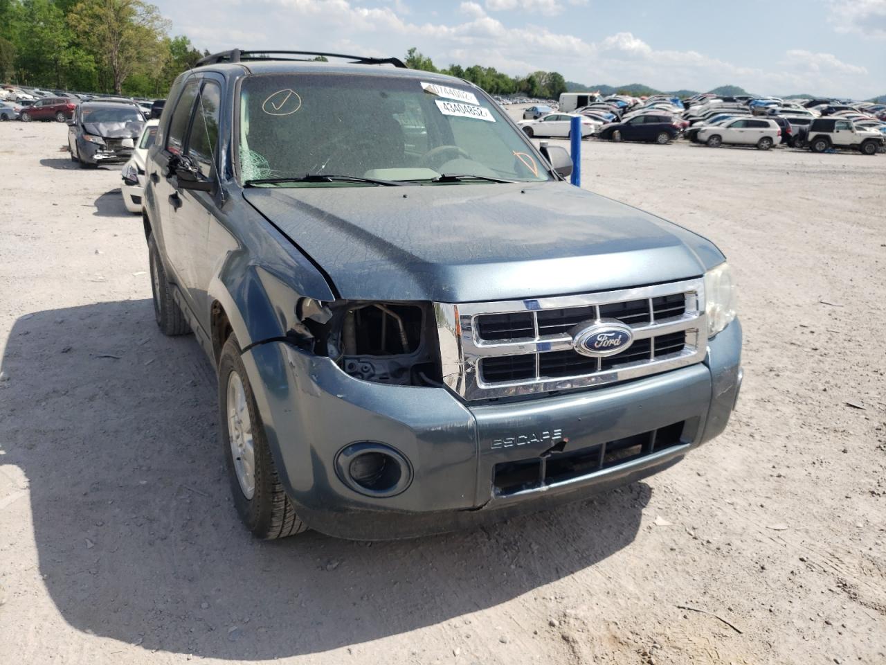 Photo 9 from auction – 2011 FORD ESCAPE XLS with VIN 1FMCU0C72BKB27667
