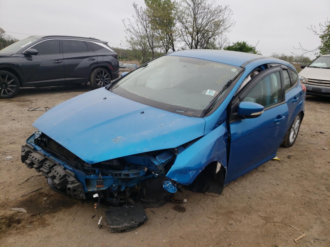 Photo 2 from auction – 2016 FORD FOCUS SE with VIN 1FADP3K24GL334446