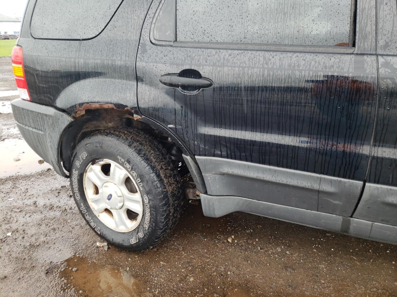 Photo 9 from auction – 2004 FORD ESCAPE XLT with VIN 1FMYU03134KA78466