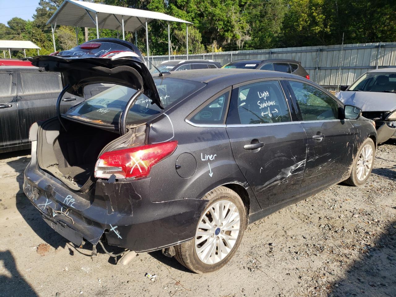 Photo 4 from auction – 2017 FORD FOCUS TITA with VIN 1FADP3J22HL208122