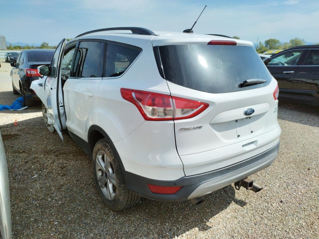 Zdjęcie 3 z aukcji – 2016 FORD ESCAPE SE z VIN 1FMCU9G95GUA68531
