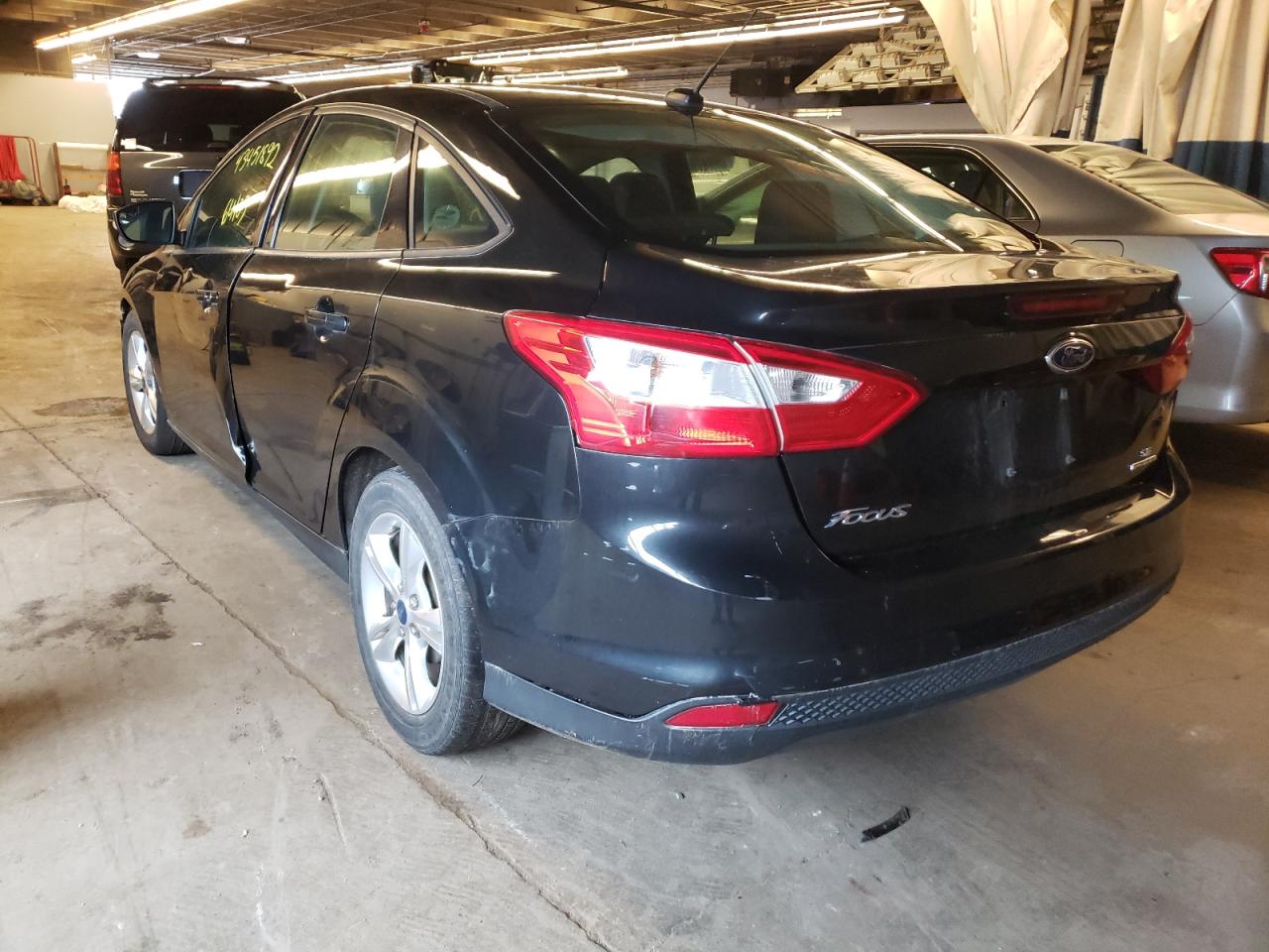 Photo 3 from auction – 2014 FORD FOCUS SE with VIN 1FADP3F20EL320440