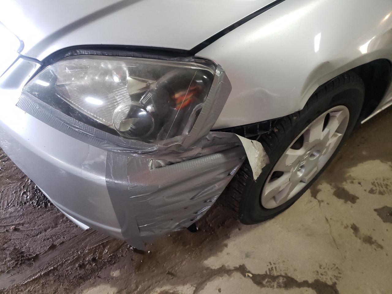 Photo 9 from auction – 2002 HONDA CIVIC DX with VIN 1HGES26752L075280