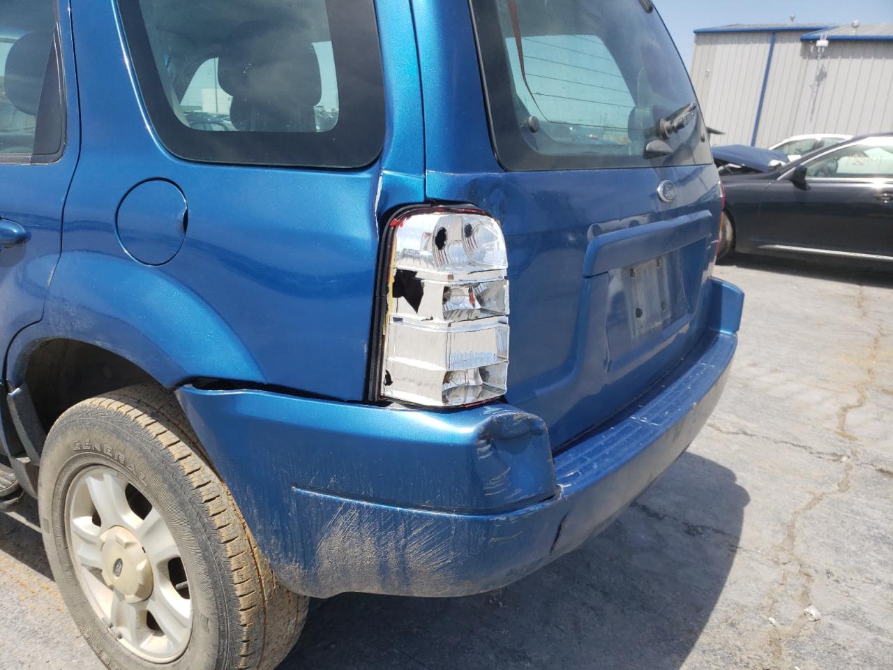 Photo 9 from auction – 2003 FORD ESCAPE XLS with VIN 1FMYU92123KD61929