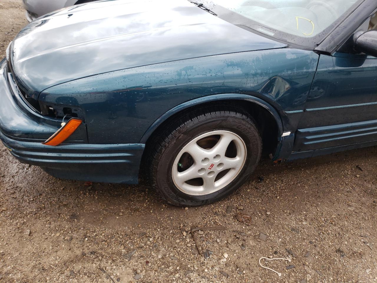 Photo 9 from auction – 1995 OLDSMOBILE CUTLASS SU with VIN 1G3WT32M0SD355586