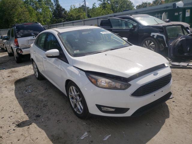 FORD FOCUS SE 2015 with VIN 1FADP3F27FL297546 - Photo from auction