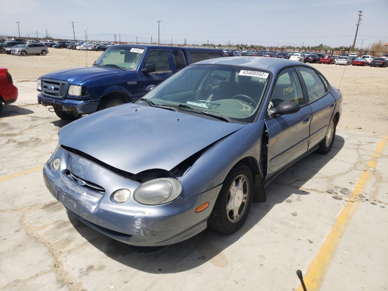 Photo 2 from auction – 1999 FORD TAURUS SE with VIN 1FAFP53SXXG189280