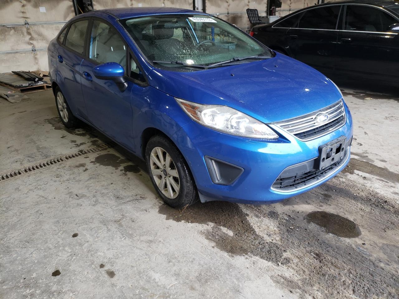 FORD FIESTA SE 2011 with VIN 3FADP4BJ9BM106799 - Photo from auction