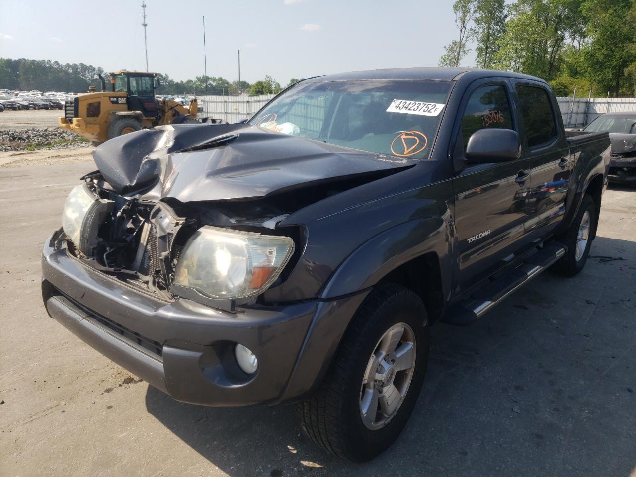 Photo 2 from auction – 2011 TOYOTA TACOMA DOU with VIN 3TMJU4GN2BM117659