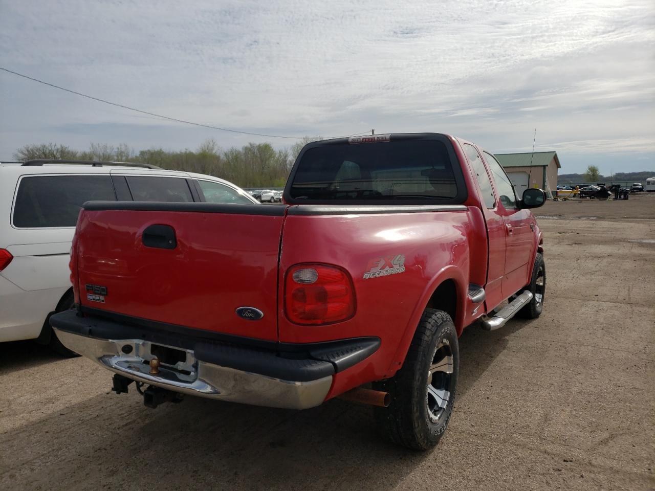 Photo 4 from auction – 2003 FORD F150 with VIN 2FTRX08L23CA74714