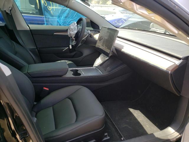 Photo 5 from auction – 2022 TESLA MODEL 3 with VIN 5YJ3E1EB0NF128665