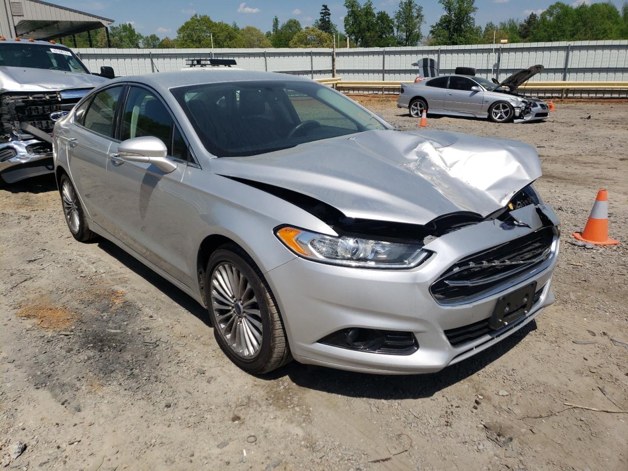 FORD FUSION TIT 2016 with VIN 3FA6P0K95GR362147 - Photo from auction