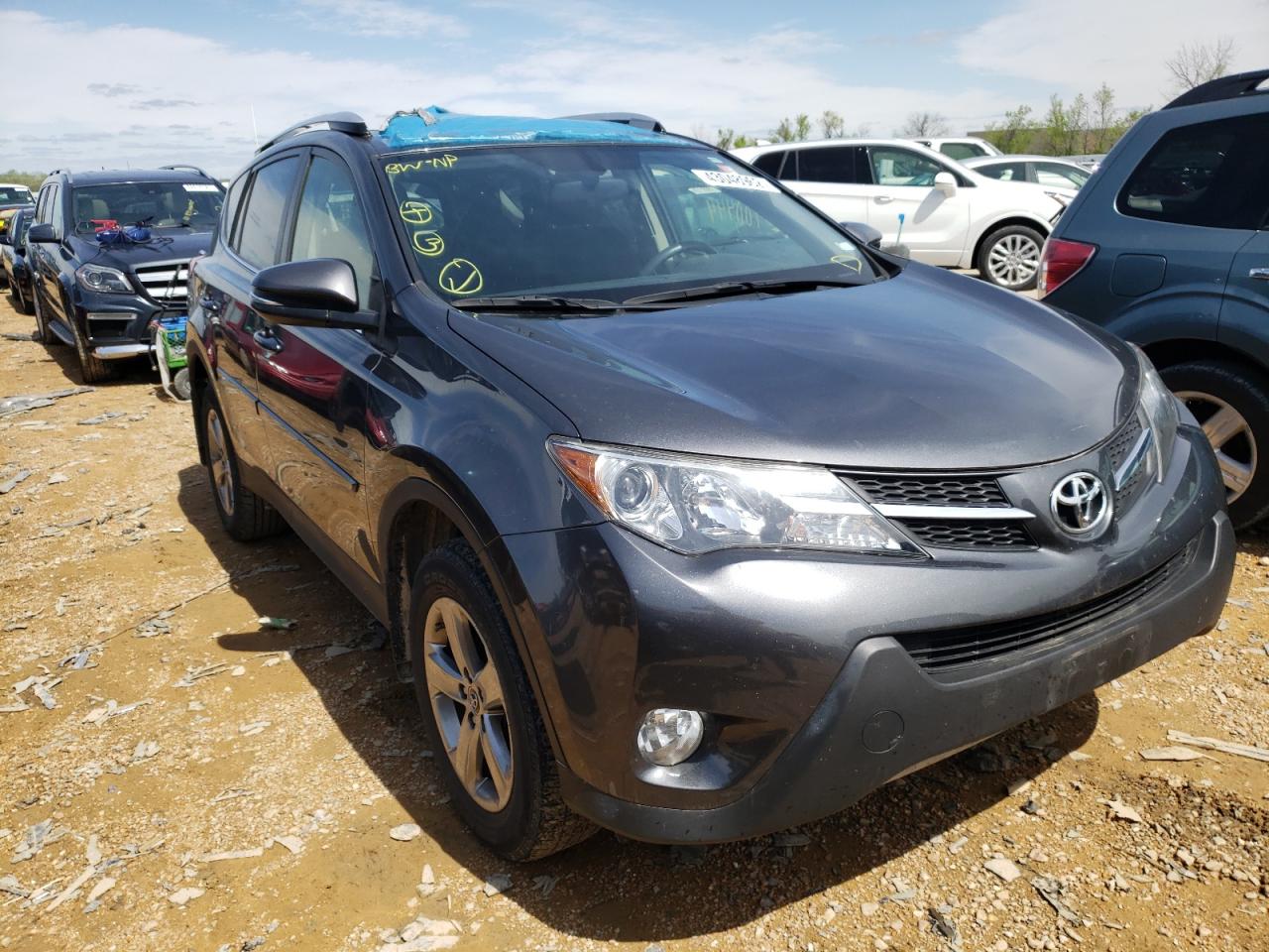 TOYOTA RAV4 XLE 2015 with VIN JTMRFREV9FD116930 - Photo from auction