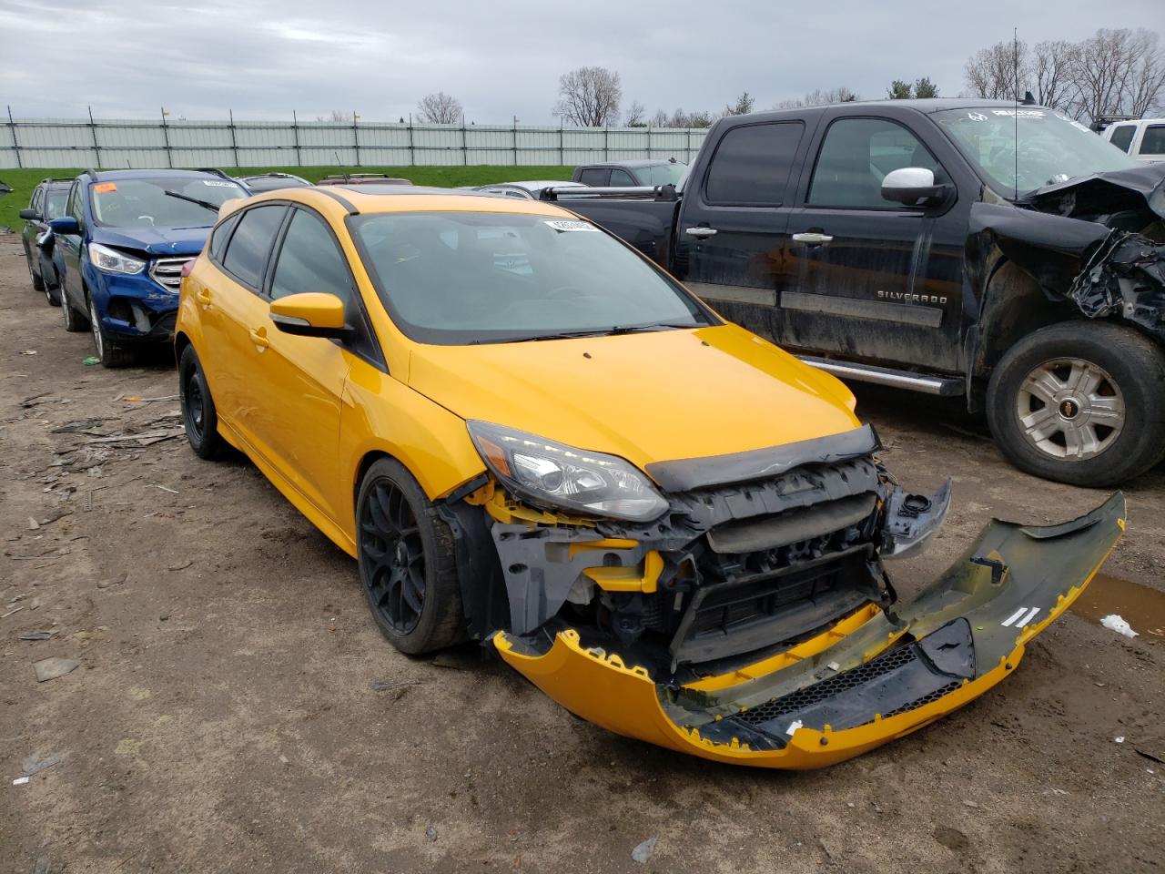 FORD FOCUS ST 2013 with VIN 1FADP3L94DL165455 - Photo from auction