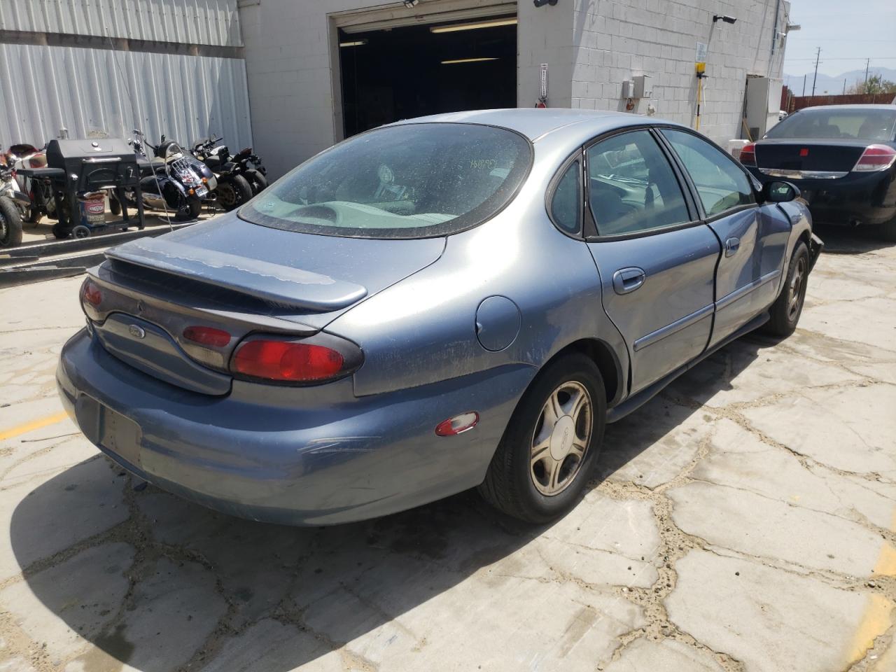 Photo 4 from auction – 1999 FORD TAURUS SE with VIN 1FAFP53SXXG189280
