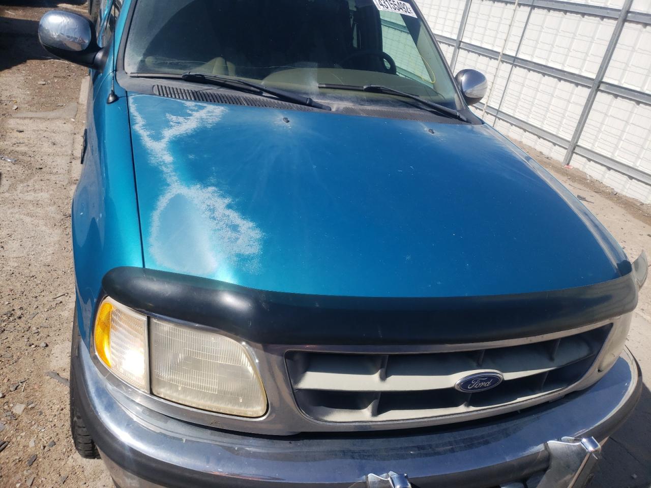 Photo 9 from auction – 1998 FORD F150 with VIN 1FTRX17LXWKC06447