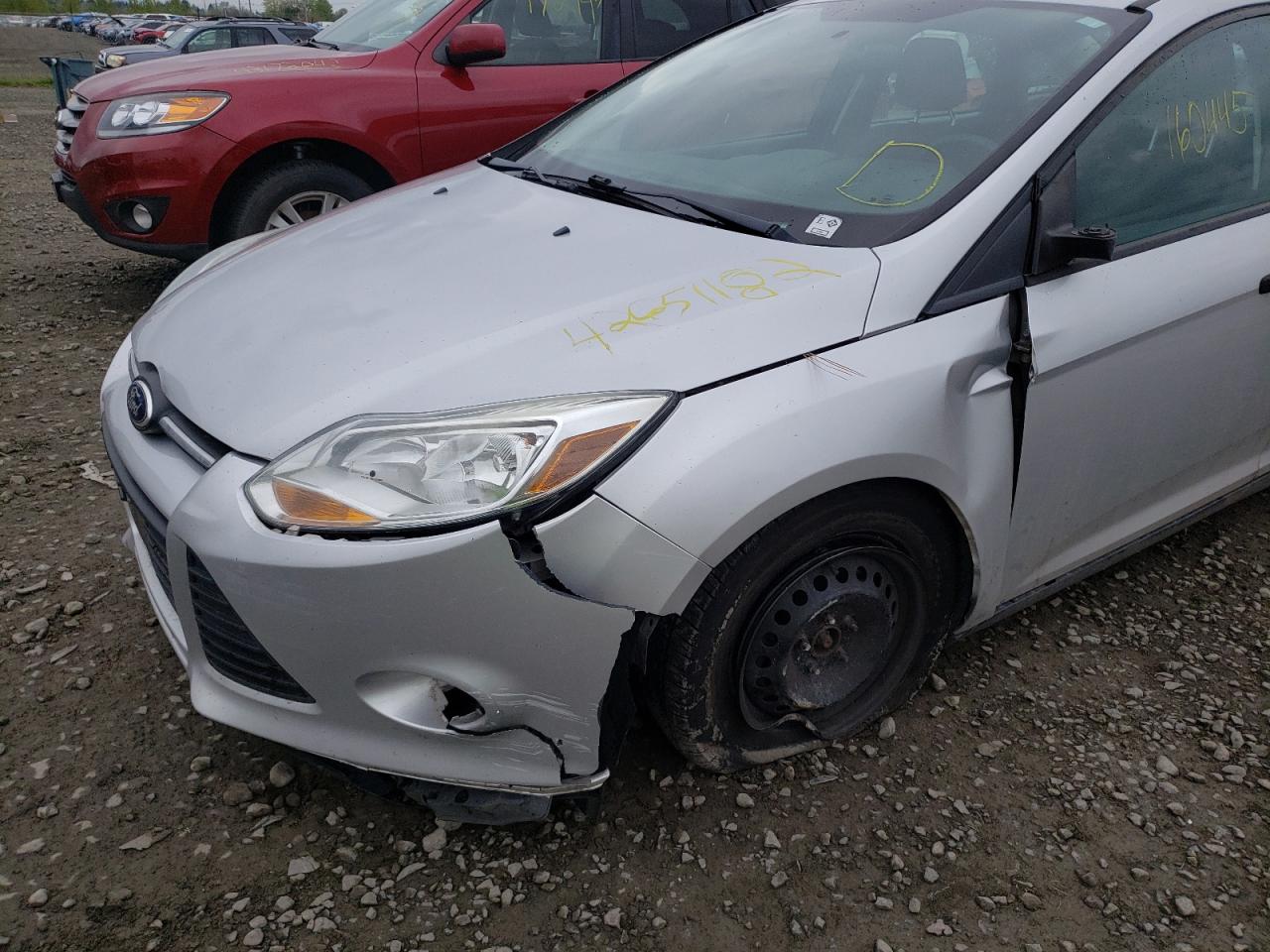 Photo 9 from auction – 2014 FORD FOCUS S with VIN 1FADP3E21EL211325