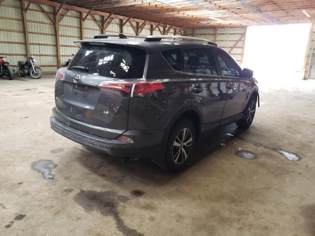 Photo 4 from auction – 2018 TOYOTA RAV4 LE with VIN 2T3ZFREV1JW431264