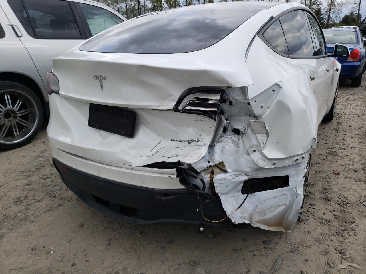 Photo 9 from auction – 2021 TESLA MODEL Y with VIN 5YJYGDEEXMF065729