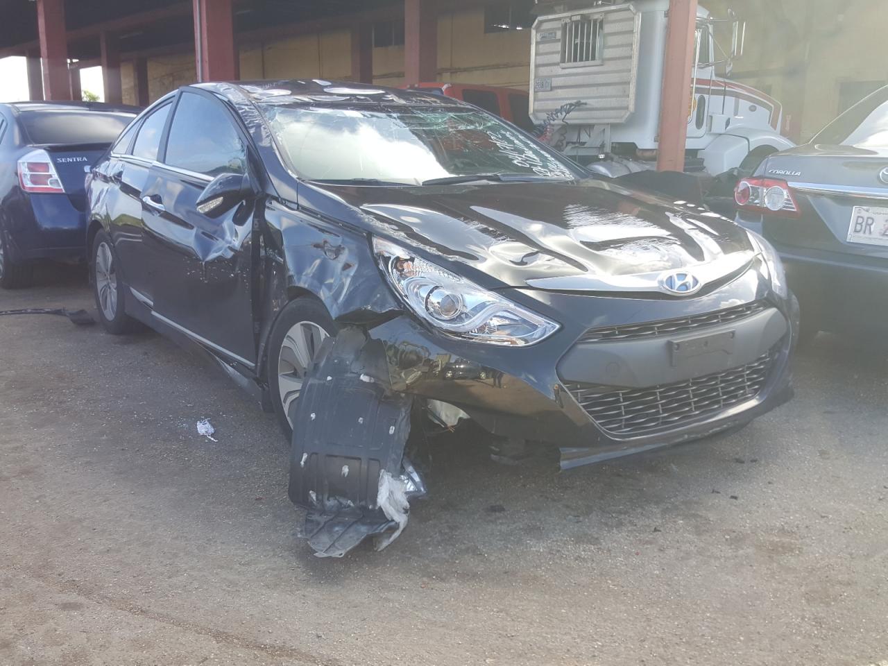 HYUNDAI SONATA HYB 2015 with VIN KMHEC4A44FA134482 - Photo from auction