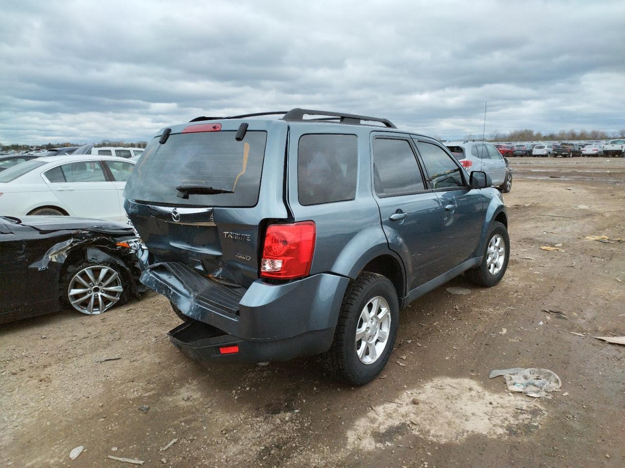 Photo 4 from auction – 2010 MAZDA TRIBUTE I with VIN 4F2CY9C71AKM02022