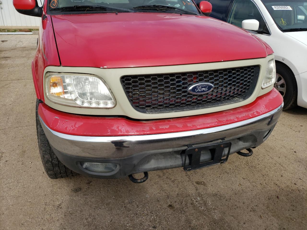 Photo 9 from auction – 2003 FORD F150 with VIN 2FTRX08L23CA74714