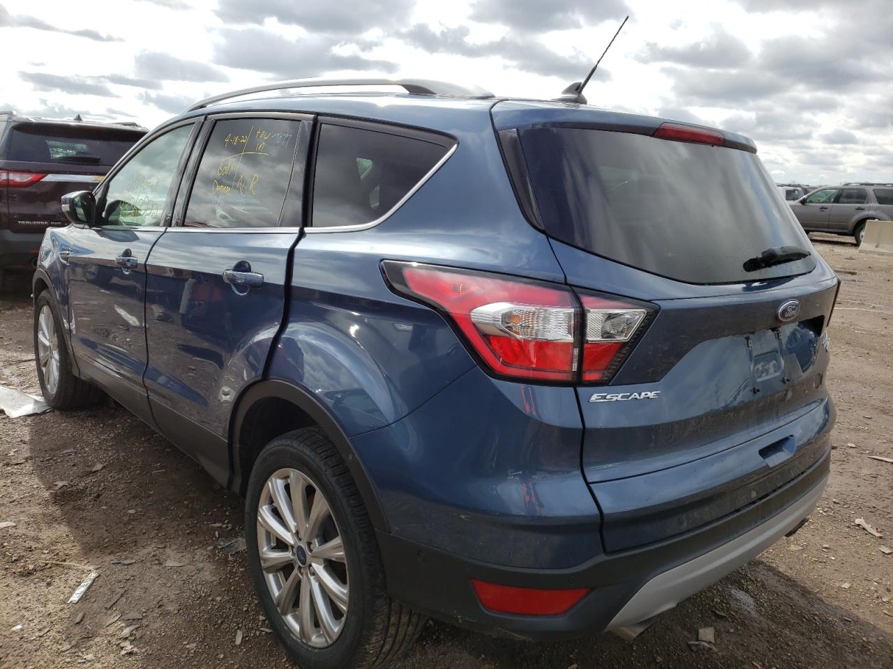 Photo 3 from auction – 2018 FORD ESCAPE TIT with VIN 1FMCU0J97JUC56608