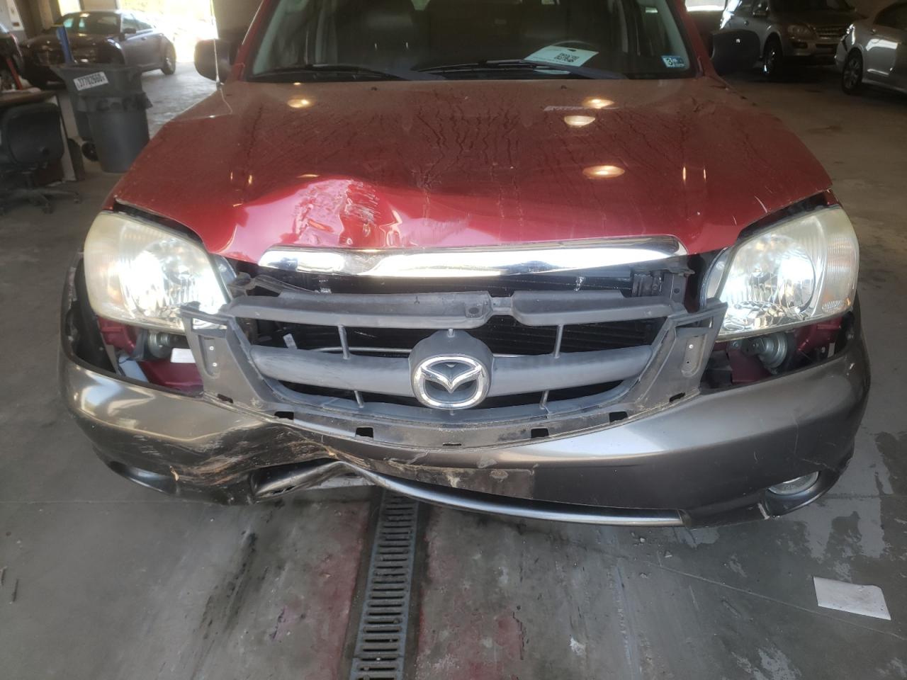 Photo 9 from auction – 2003 MAZDA TRIBUTE ES with VIN 4F2CZ06113KM16313