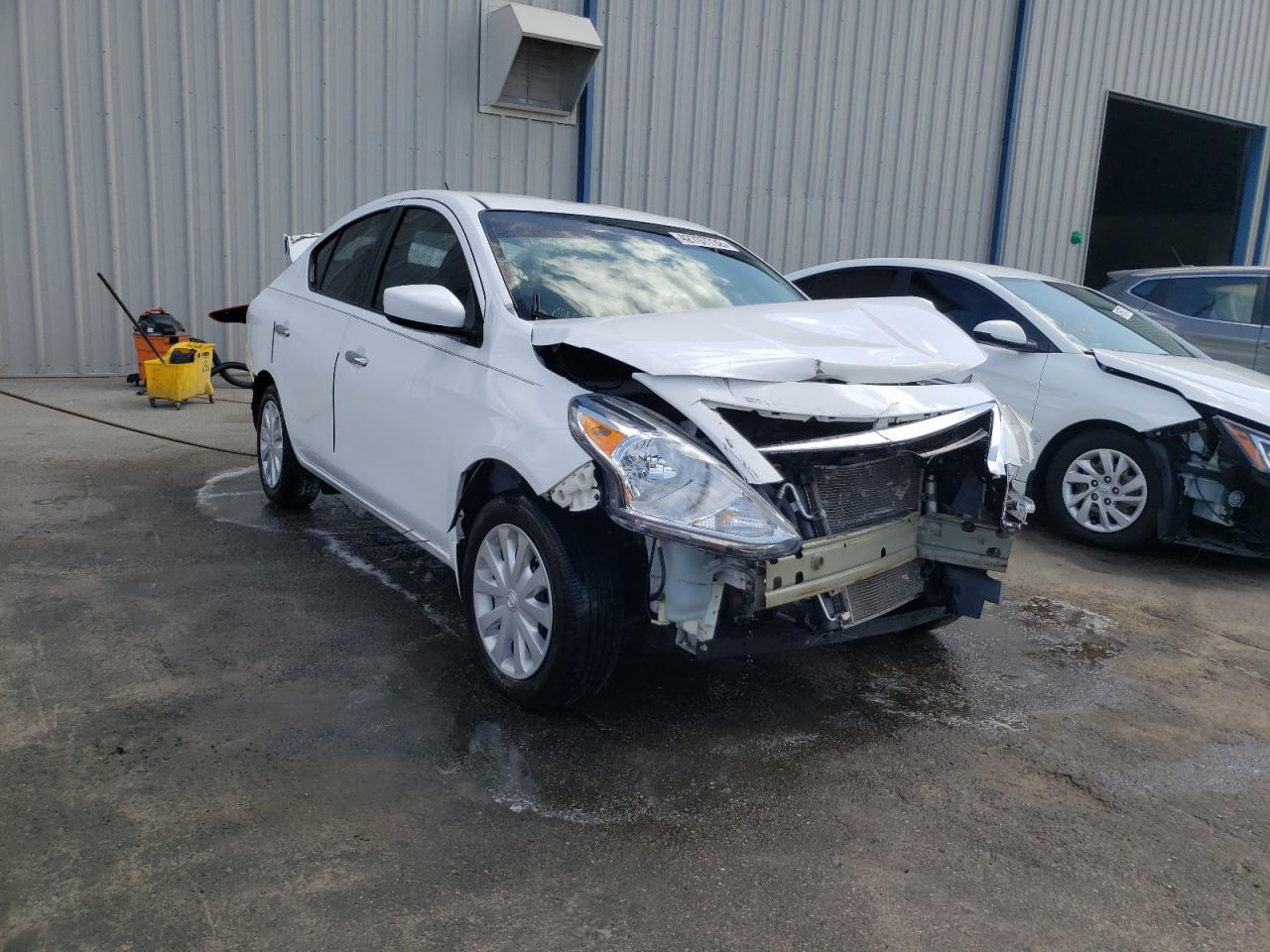 NISSAN VERSA S 2015 with VIN 3N1CN7AP6FL924413 - Photo from auction