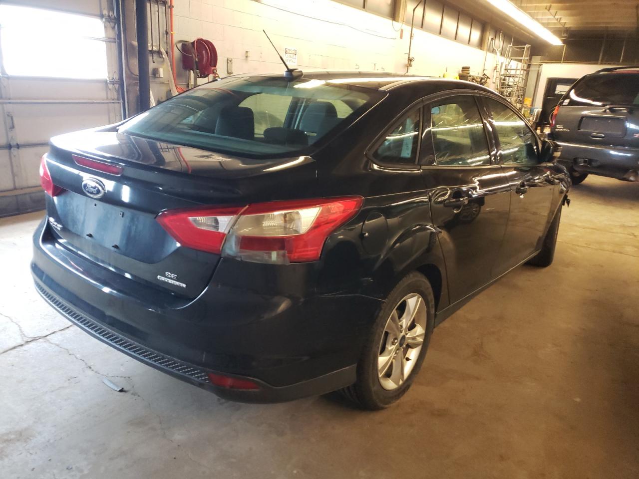 Photo 4 from auction – 2014 FORD FOCUS SE with VIN 1FADP3F20EL320440