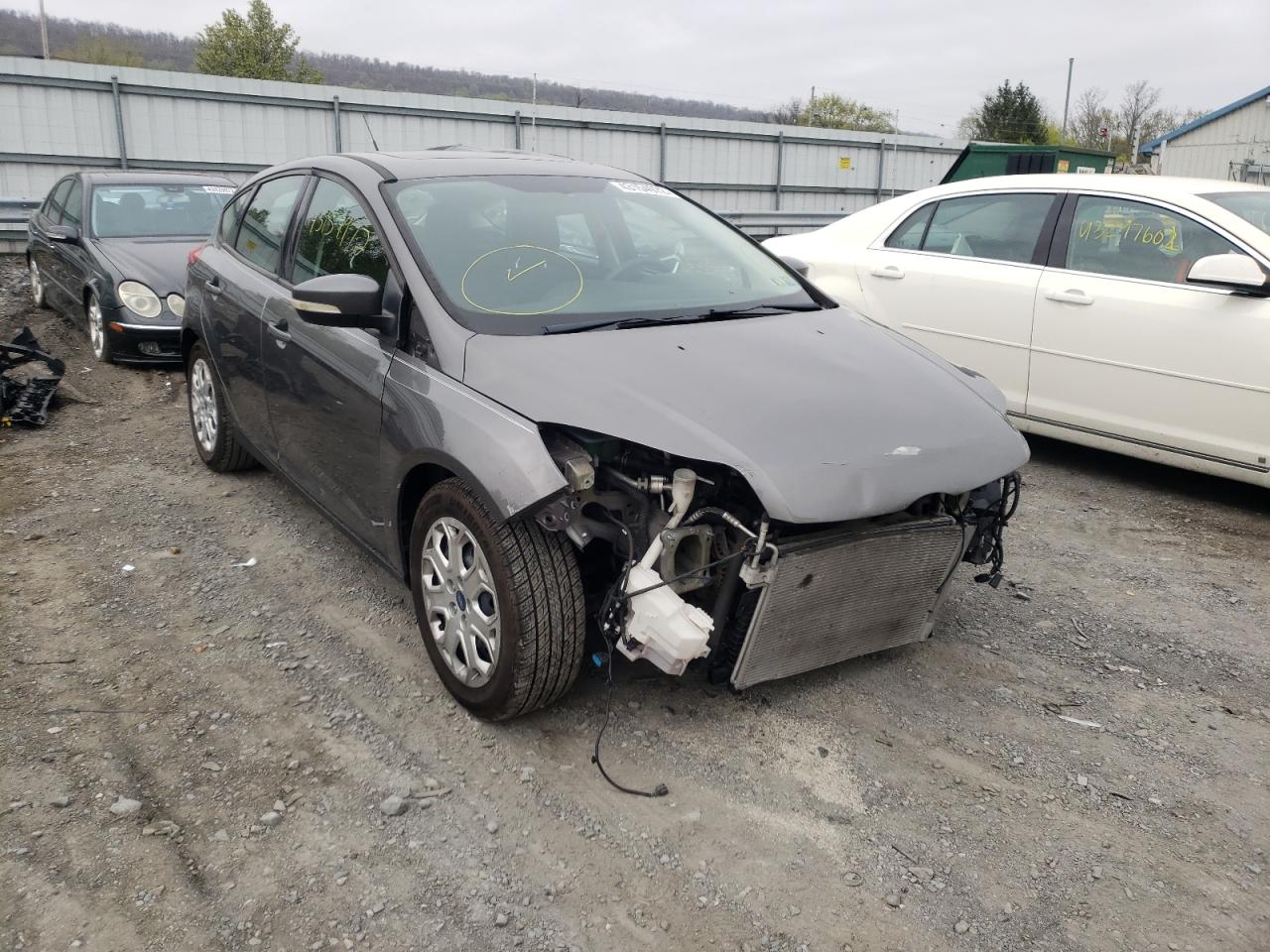 FORD FOCUS SE 2012 with VIN 1FAHP3K2XCL260137 - Photo from auction