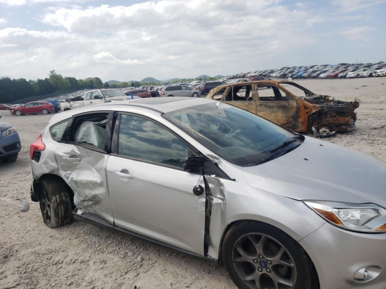 Photo 9 from auction – 2013 FORD FOCUS SE with VIN 1FADP3K25DL342793
