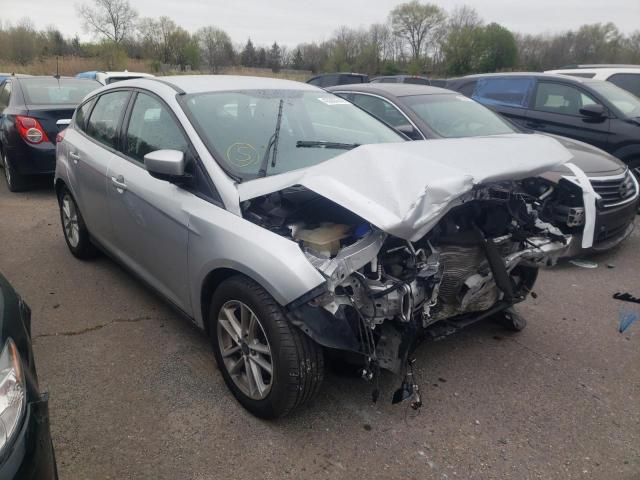 FORD FOCUS SE 2018 with VIN 1FADP3K29JL326933 - Photo from auction