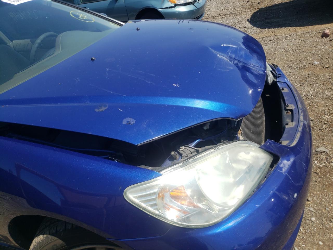 Photo 9 from auction – 2004 HONDA CIVIC LX with VIN 1HGEM225X4L021796