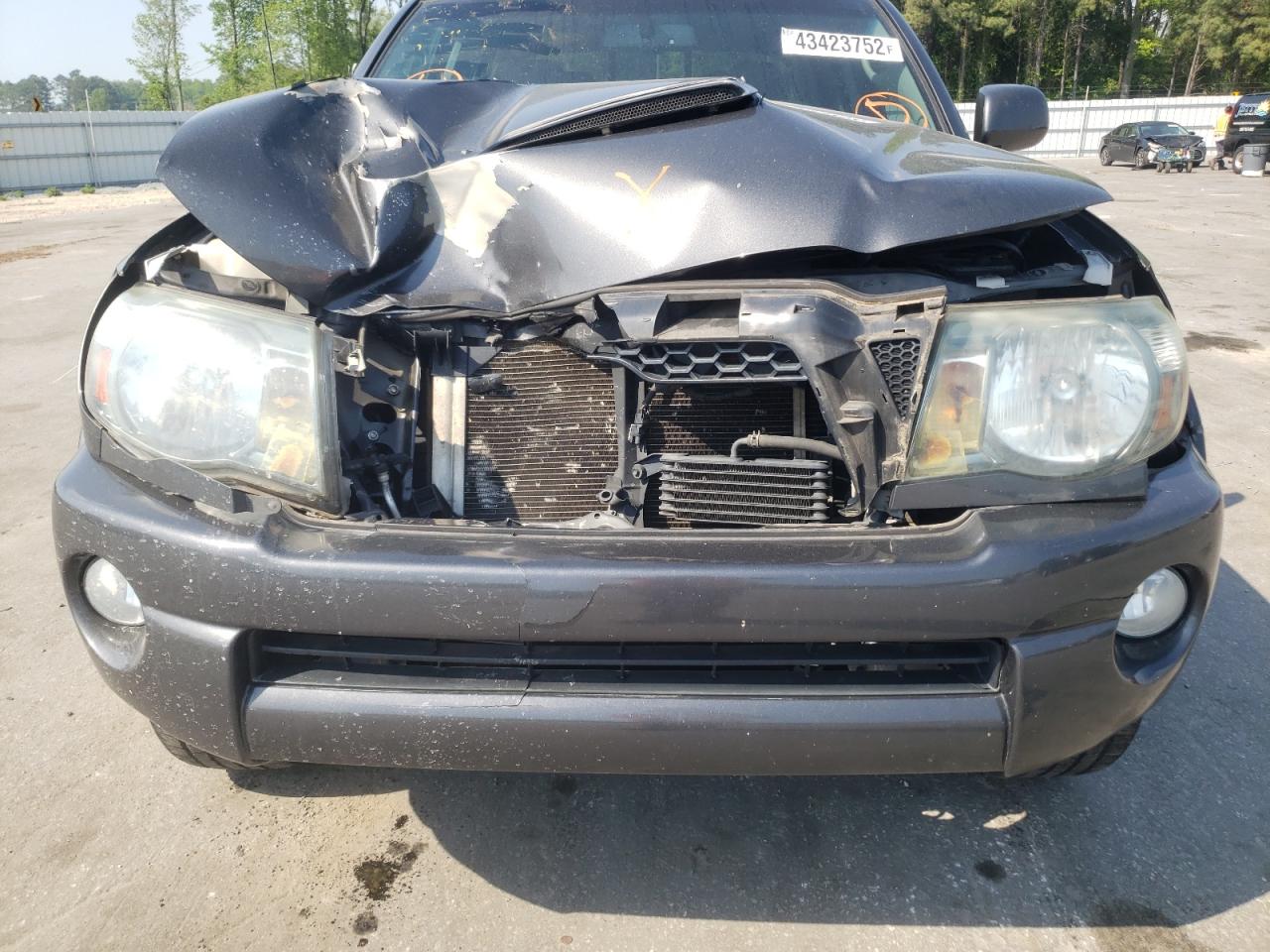 Photo 9 from auction – 2011 TOYOTA TACOMA DOU with VIN 3TMJU4GN2BM117659