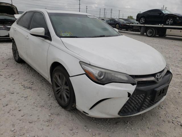 TOYOTA CAMRY LE 2017 with VIN 4T1BF1FKXHU293329 - Photo from auction