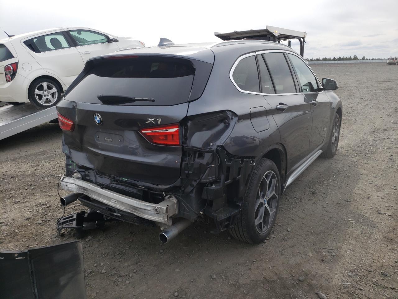 Photo 4 from auction – 2017 BMW X1 with VIN WBXHT3Z35H4A56566