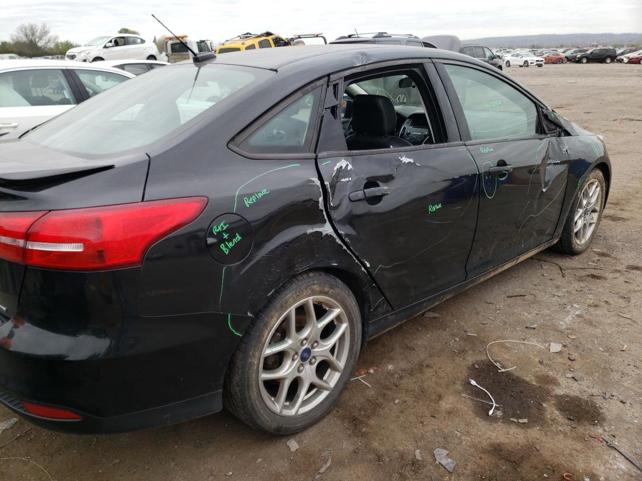 Photo 9 from auction – 2015 FORD FOCUS SE with VIN 1FADP3F21FL234281