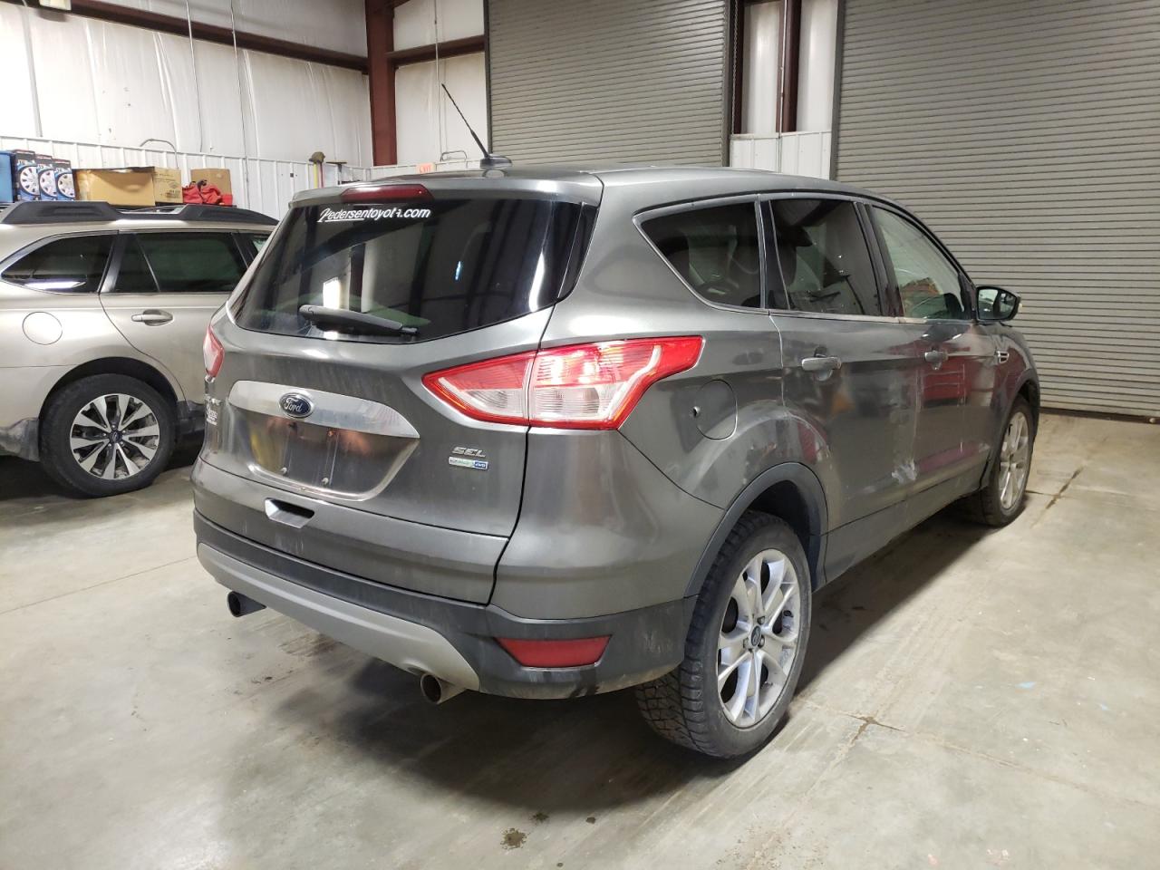 Photo 4 from auction – 2013 FORD ESCAPE SEL with VIN 1FMCU9H98DUA29992
