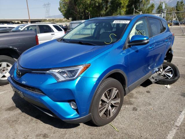Photo 2 from auction – 2017 TOYOTA RAV4 XLE with VIN JTMWFREV3HJ145220