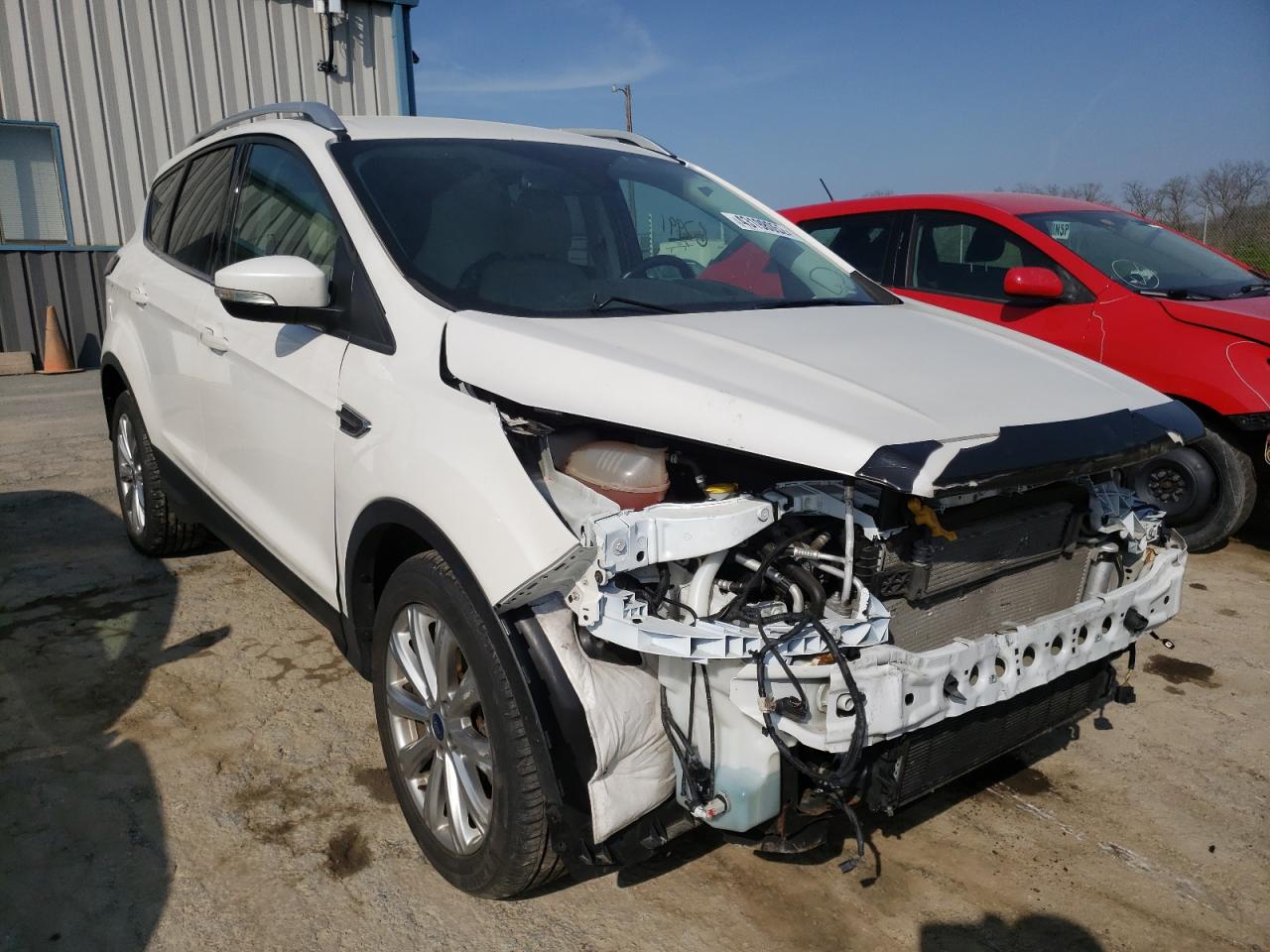 FORD ESCAPE TIT 2017 with VIN 1FMCU9JDXHUB34313 - Photo from auction
