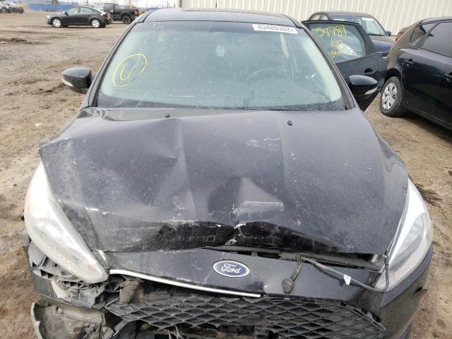 Photo 2 from auction – 2018 FORD FOCUS SE with VIN 1FADP3K28JL296999