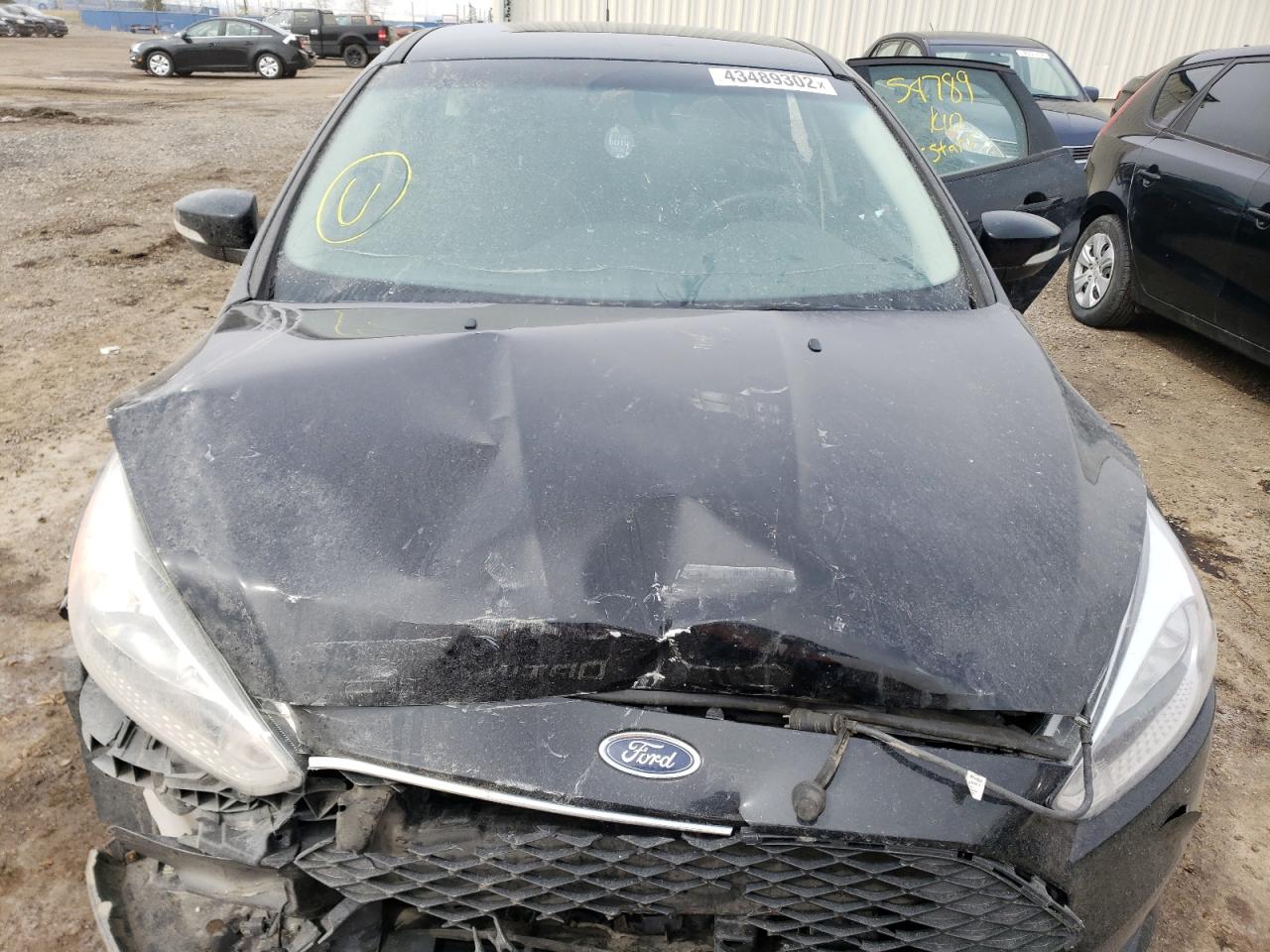 Photo 12 from auction – 2018 FORD FOCUS SE with VIN 1FADP3K28JL296999