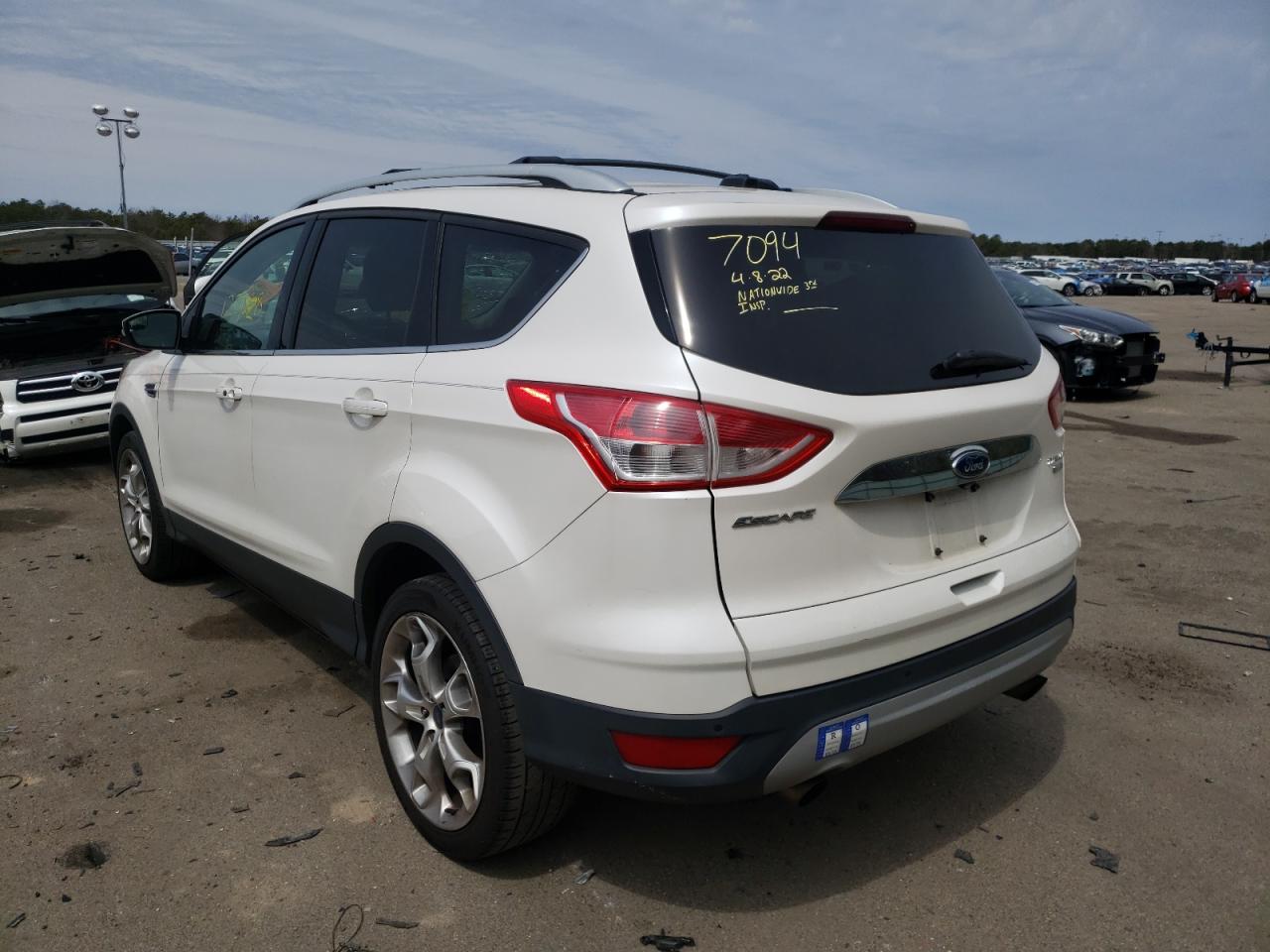 Photo 3 from auction – 2014 FORD ESCAPE TIT with VIN 1FMCU9J99EUA34100