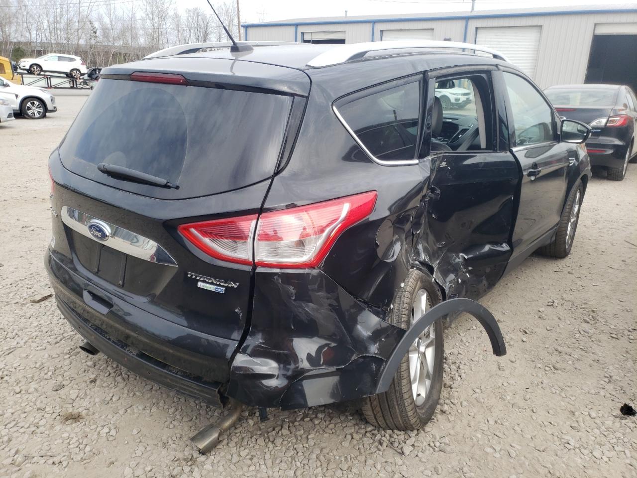 Photo 4 from auction – 2015 FORD ESCAPE TIT with VIN 1FMCU9J9XFUB86422