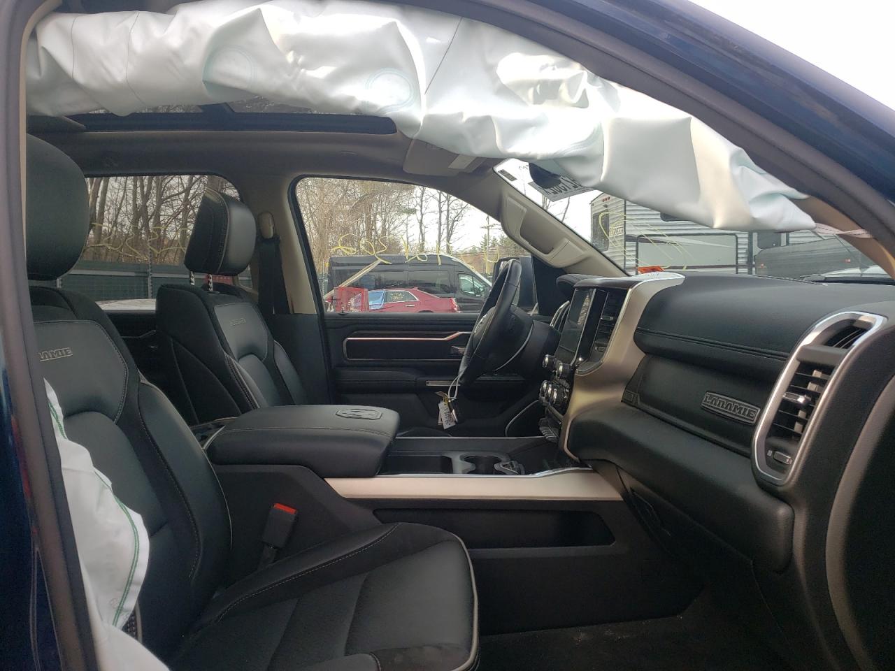 Photo 5 from auction – 2021 RAM 1500 LARAM with VIN 1C6SRFJT6MN611984